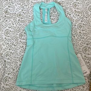 Brand new light blue LuluLemon yoga top. Never worn. Size 4.